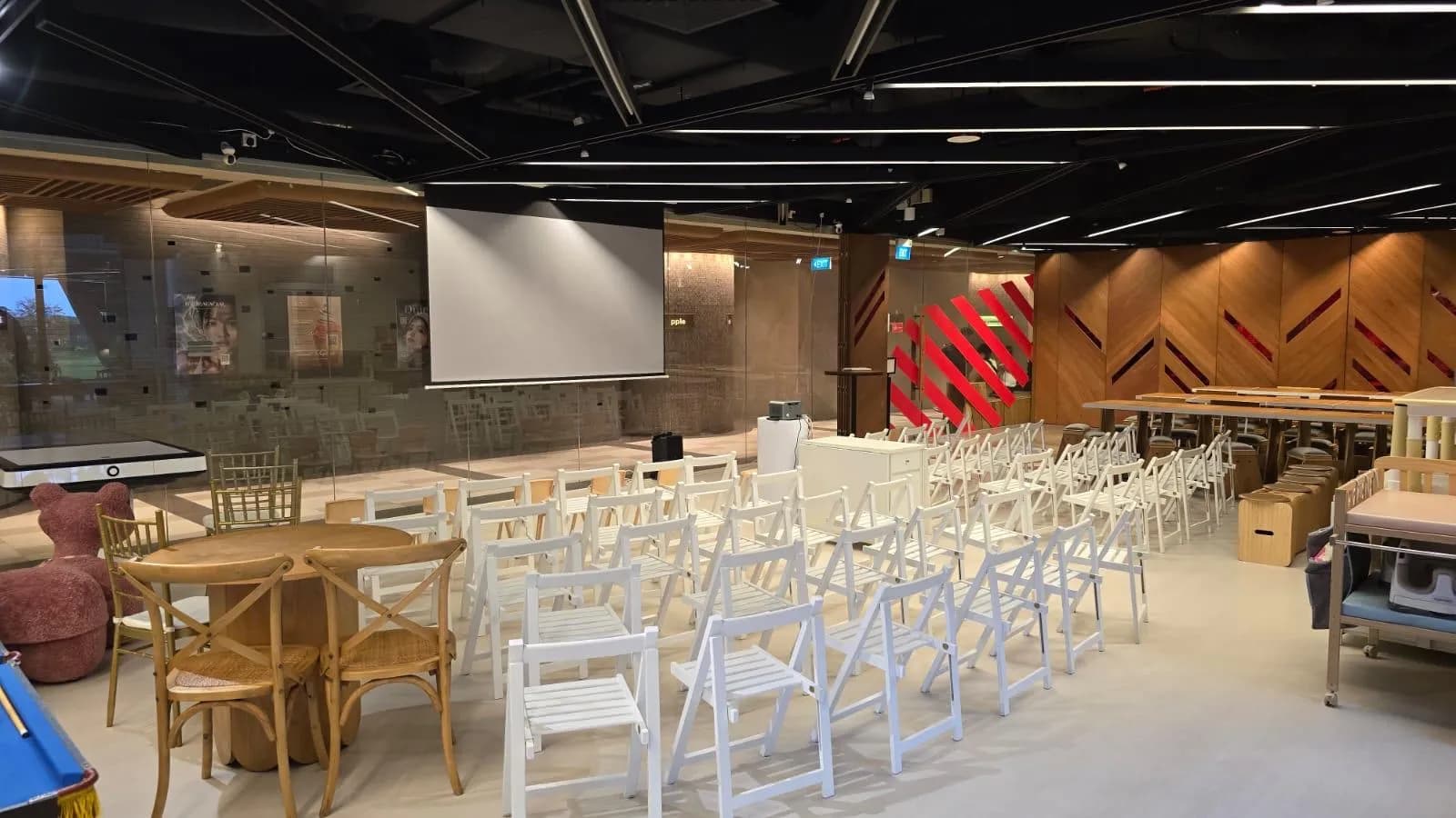 The Our Second Home event space arranged with rows of chairs for a corporate event or private function