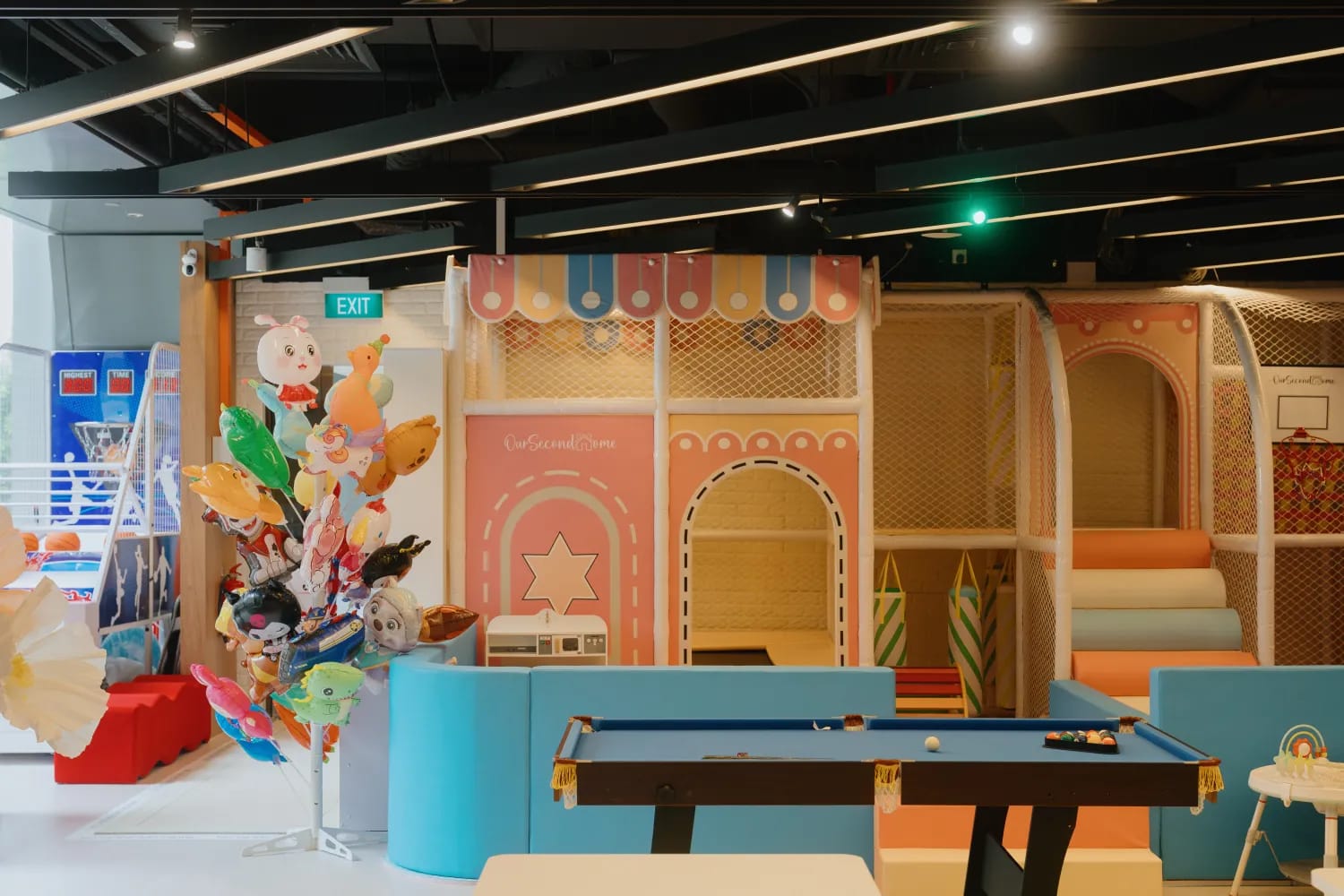 Games zone with pool table and arcade